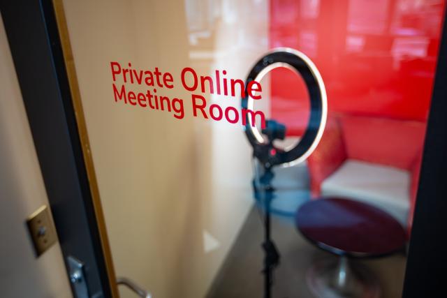 Door of private online meeting room.